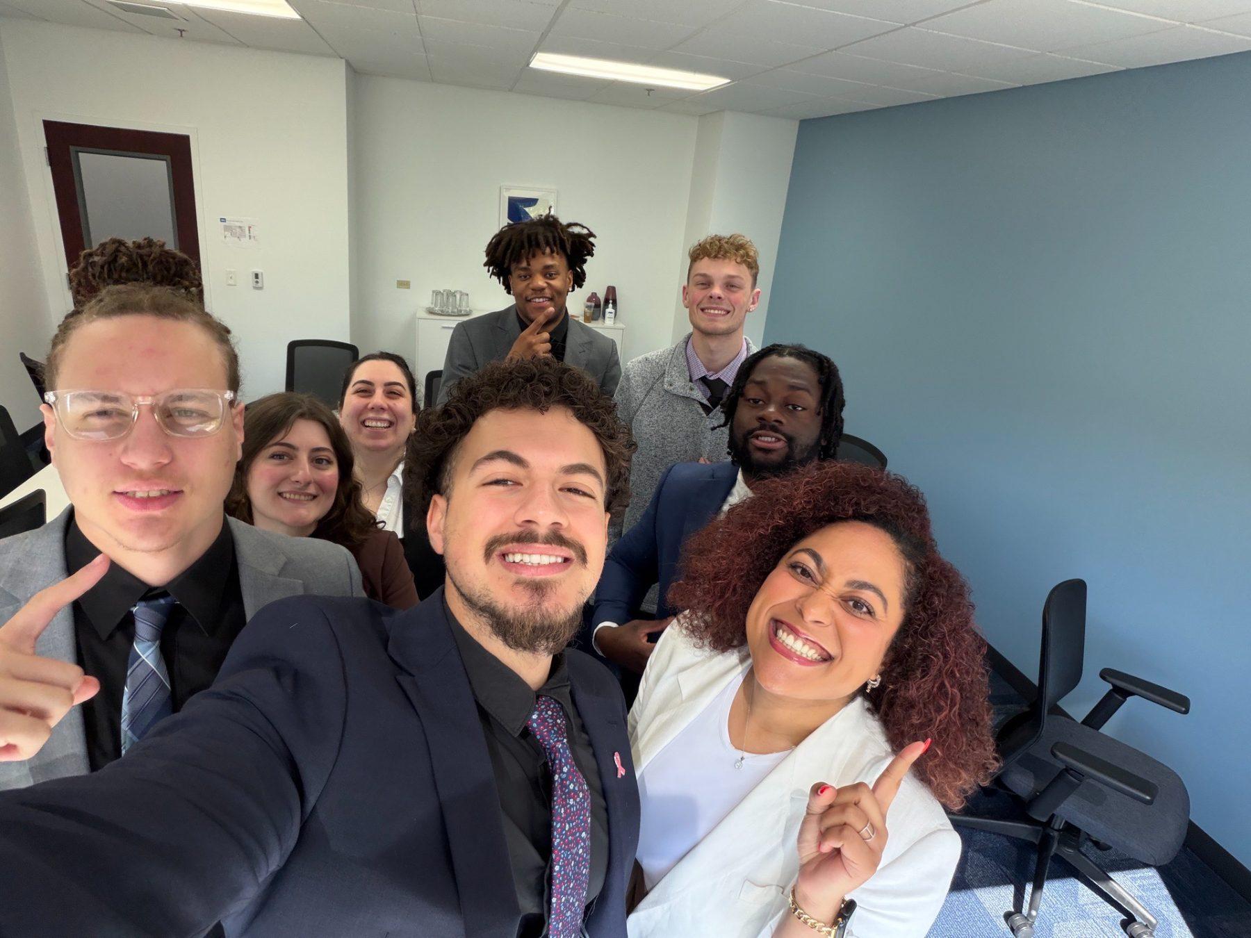 Team members together in the Tampa office